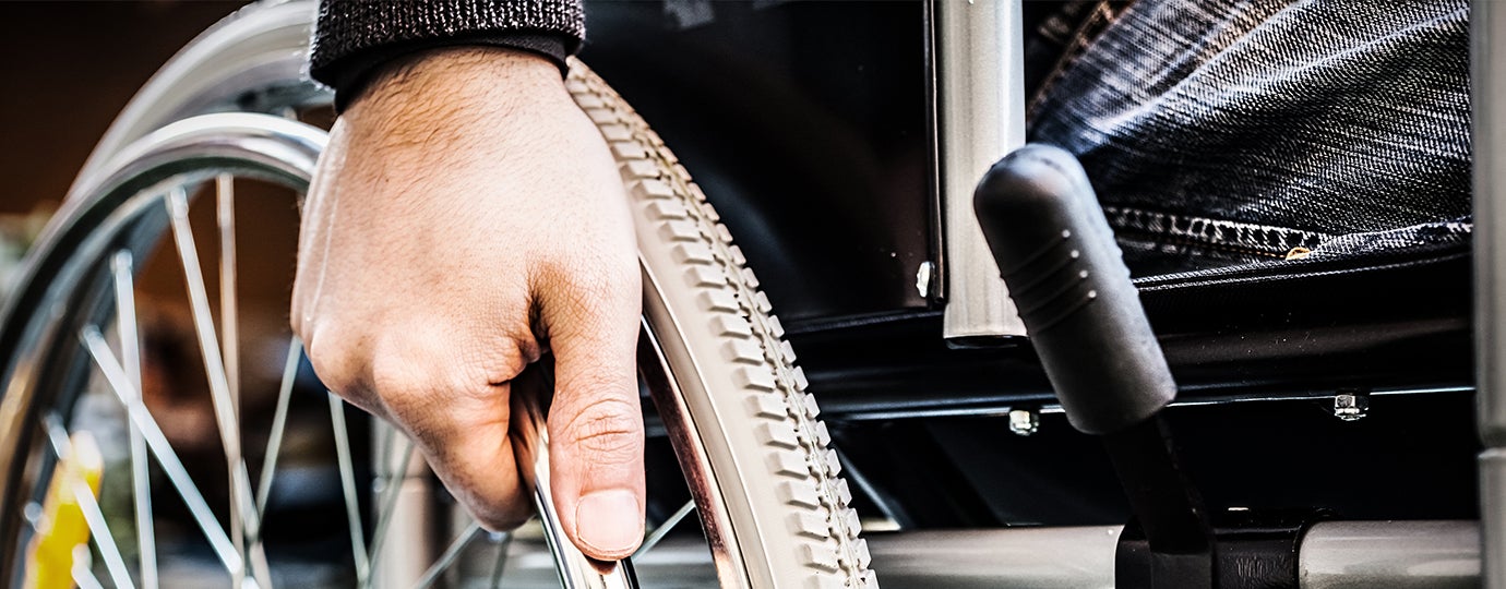 Close up camera shot of a wheelchair.